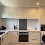 Stylish 2 Bed Retreat Close To Cbd With Parking