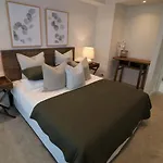 The Carlton Apartments