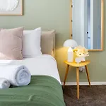 Relax In Designer Luxury At Central City Townhouse