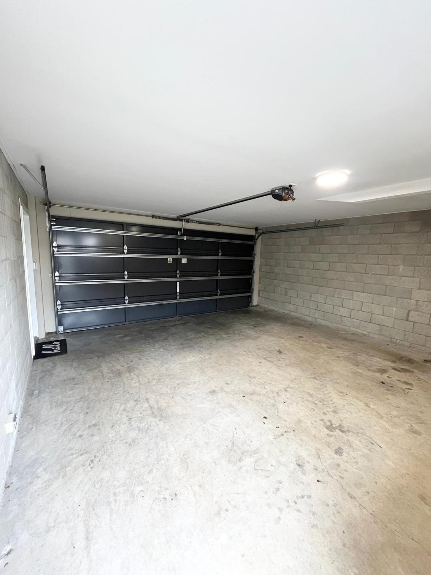 Apartment Townhouse Close To Cbd With Onsite Parking And Garaging