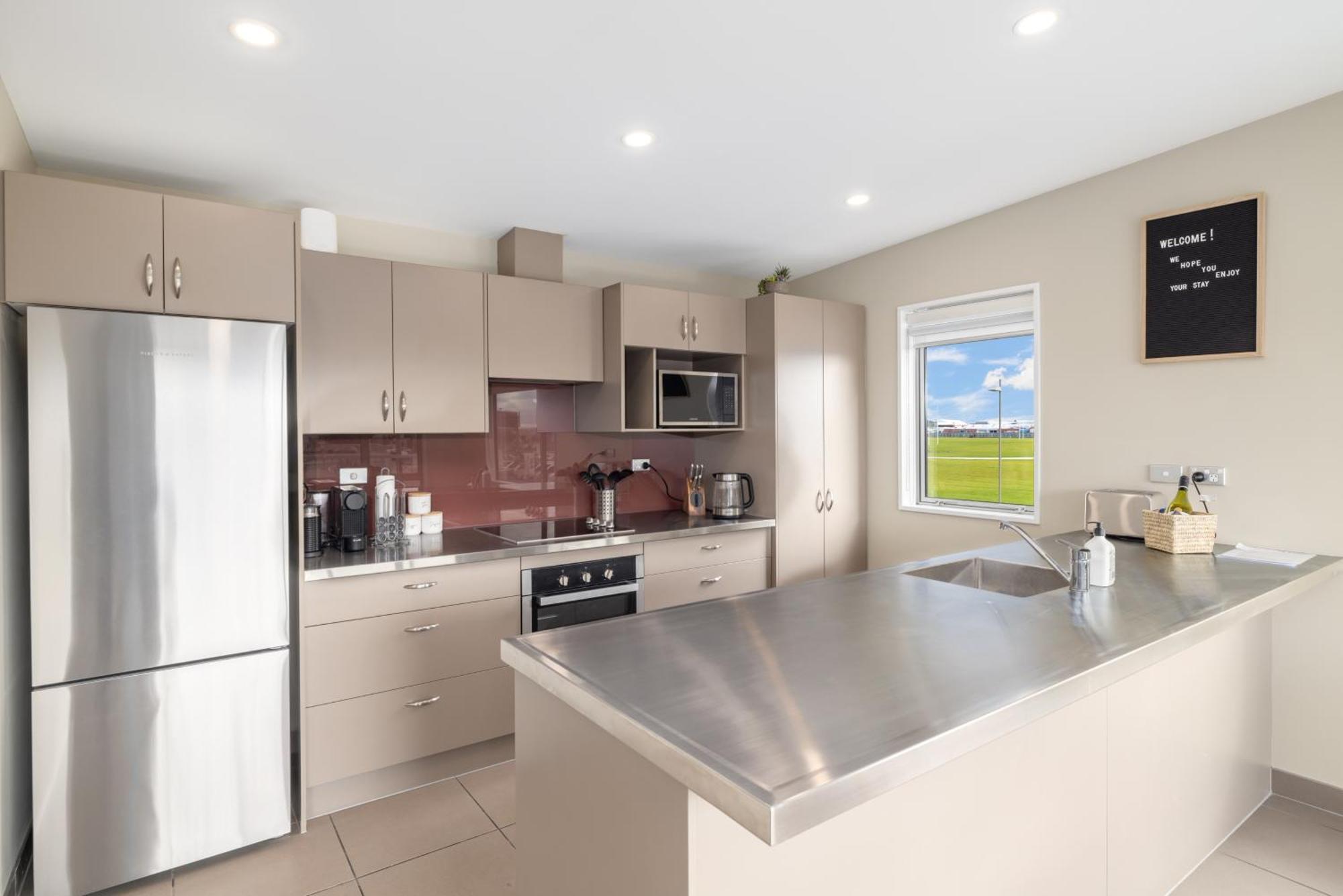 Townhouse Close To Cbd With Onsite Parking And Garaging