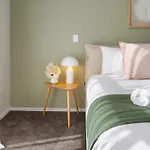 Relax In Designer Luxury At Central City Townhouse